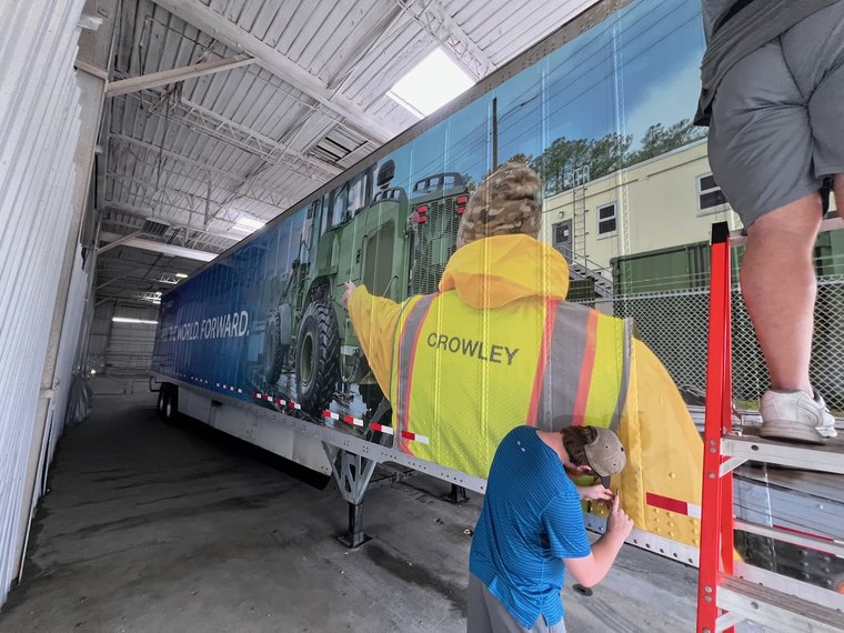 Semi trailer wrapped with full-color mural graphics