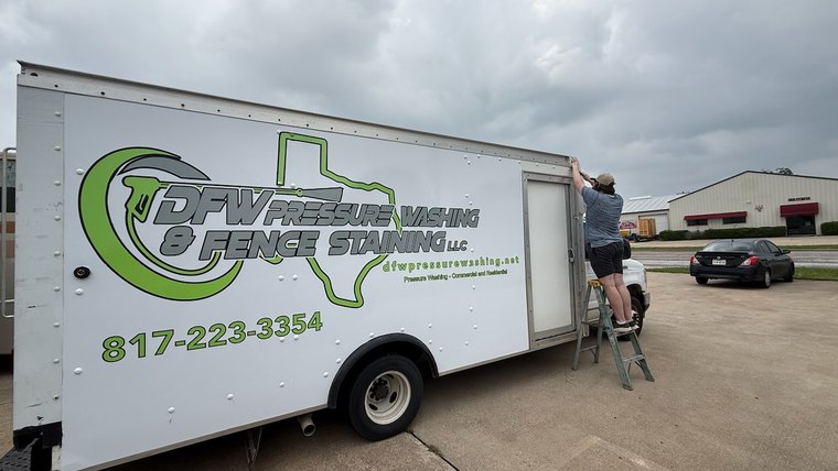 Enclosed trailer graphics for a service business