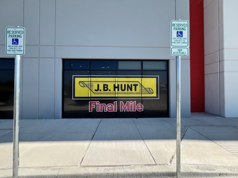 Storefront signage for a final mile facility